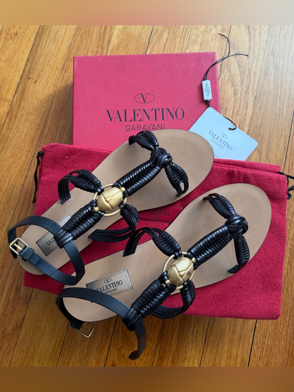 Valentino Black Braided Leather Sandals With Gold Medallion